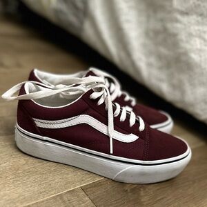 Vans dark red.